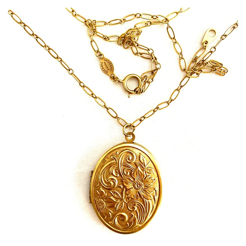 Gold locket by Catherine Popesco